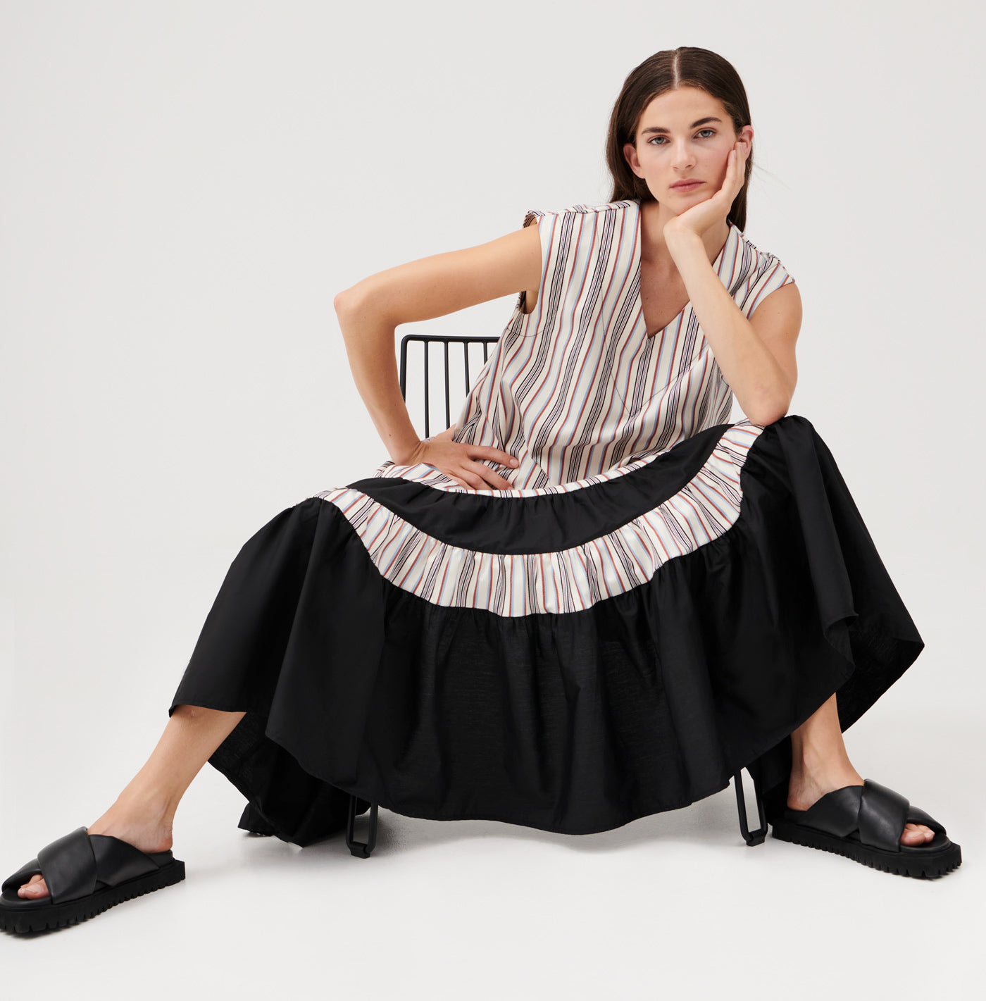 Cuspi Forever Ruffle Dress in Stripe. Shop local and explore the latest collection of trans-seasonal styles designed and made in Melbourne, Australia. Cuspi: born with the desire to create considered high quality timeless pieces for everyday life.